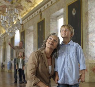 Visitors in the ancestral portrait gallery at Ludwigsburg Residential Palace