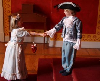 Children in Baroque costumes at Ludwigsburg Residential Palace