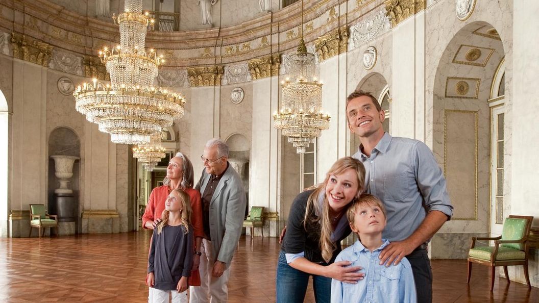 Visitors in the marble hall at Ludwigsburg Residential Palace